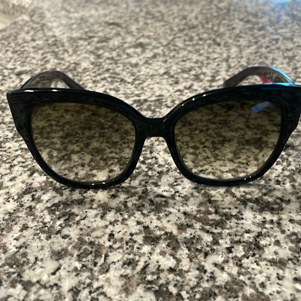Gucci sunglasses.